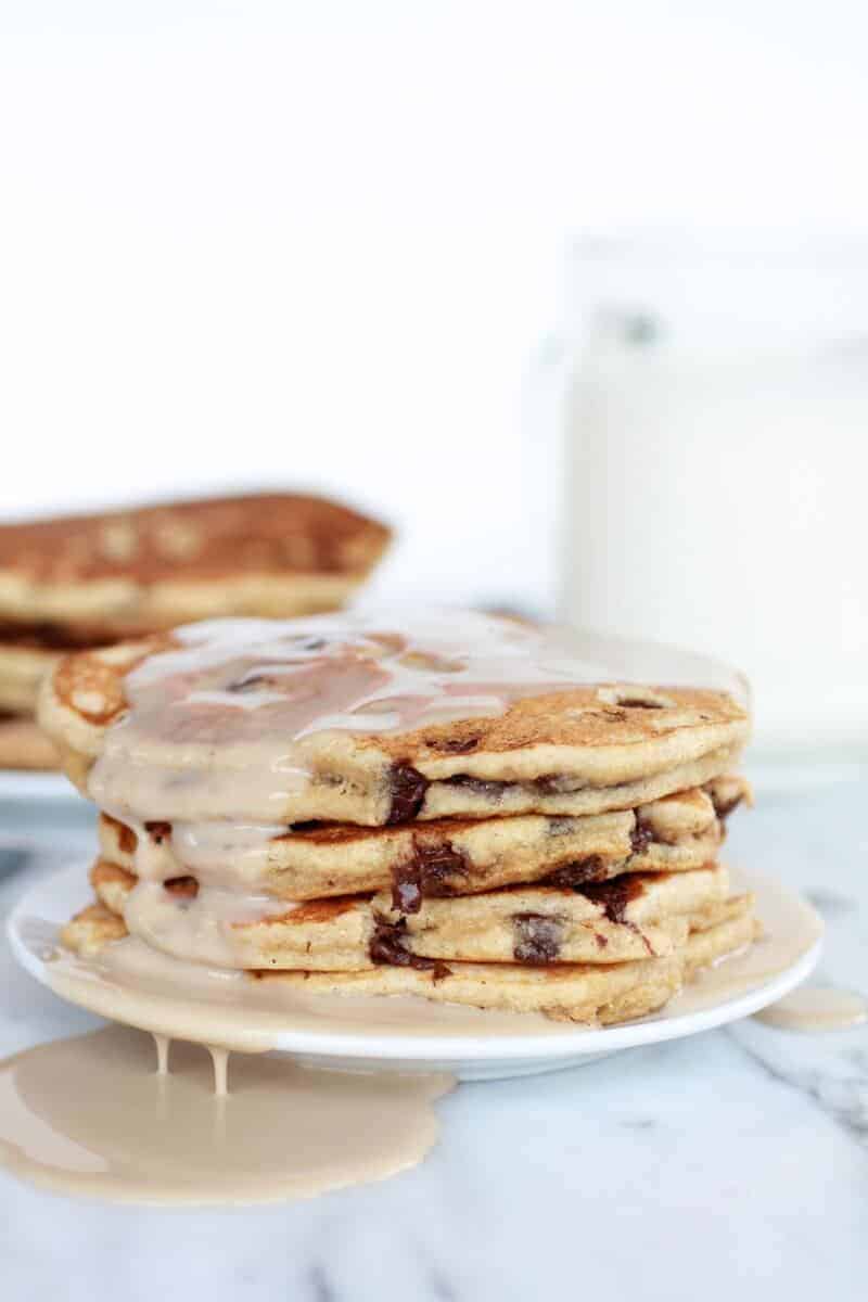 Whole Wheat Chocolate Chip Banana Bread Pancakes with a Vanilla Coconut Glaze
