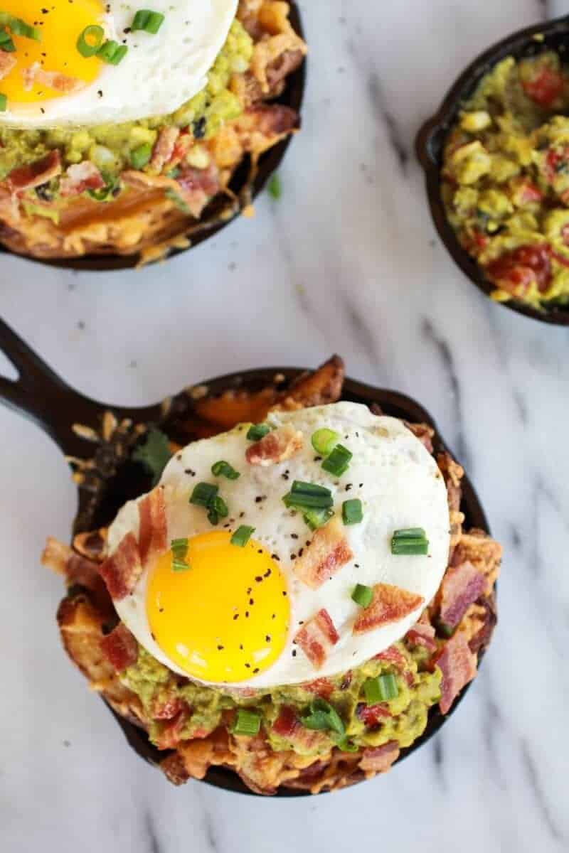 Cheesy Cajun Fries with Grilled Corn Guacamole, Bacon and Fried Eggs | halfbakedharvest.com/