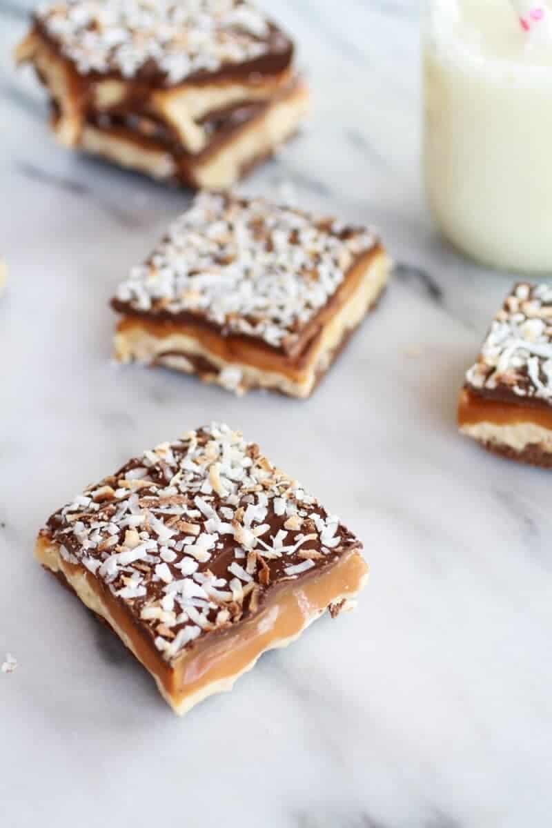 Toasted Coconut Caramel Peanut Butter Snickers Bars | halfbakedharvest.com