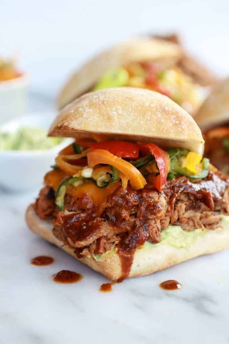 Cheesy Crockpot Cajun Pulled Pork with Southwest Pepper-Corn Slaw | halfbakedharvest.com