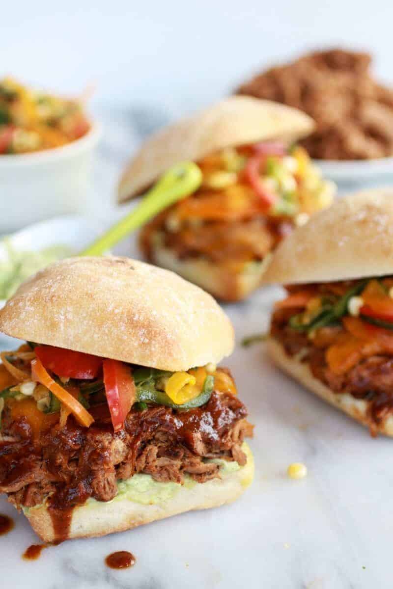 Cheesy Crockpot Cajun Pulled Pork with Southwest Pepper-Corn Slaw | halfbakedharvest.com