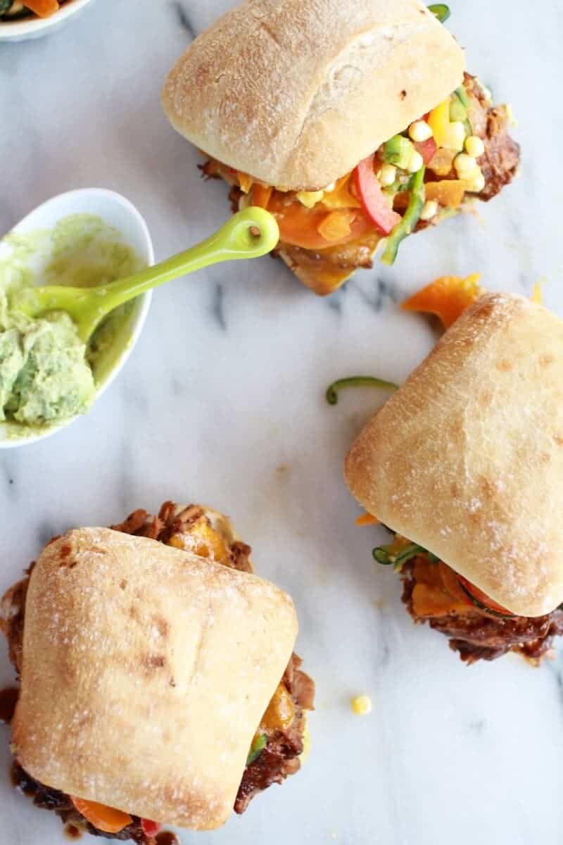 Cheesy Crockpot Cajun Pulled Pork with Southwest Pepper-Corn Slaw | halfbakedharvest.com