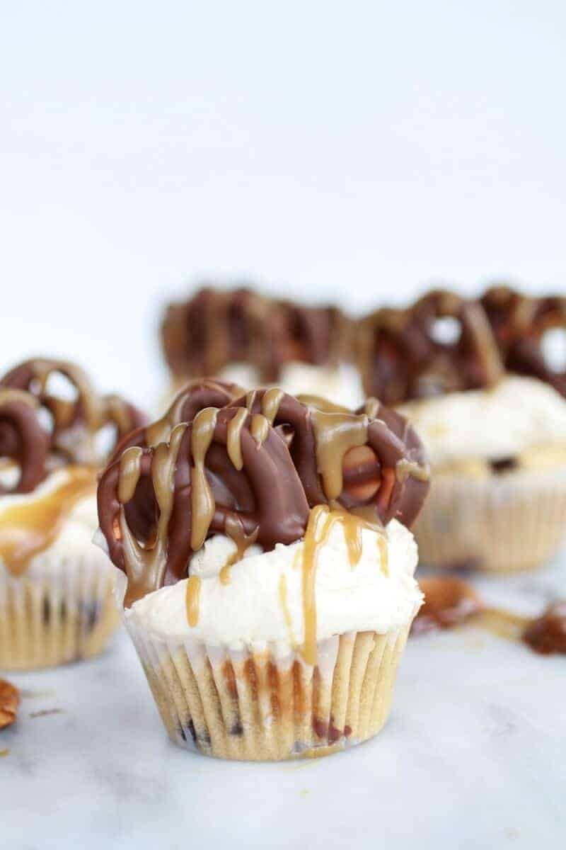 Chocolate Covered Pretzel Peanut Butter Cupcakes with Butterscotch Frosting | halfbakedharvest.com