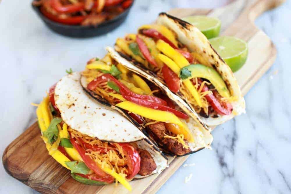Easy Chicken Fajitas with Thai Mango Slaw and Coconut Rice | halfbakedharvest.com/