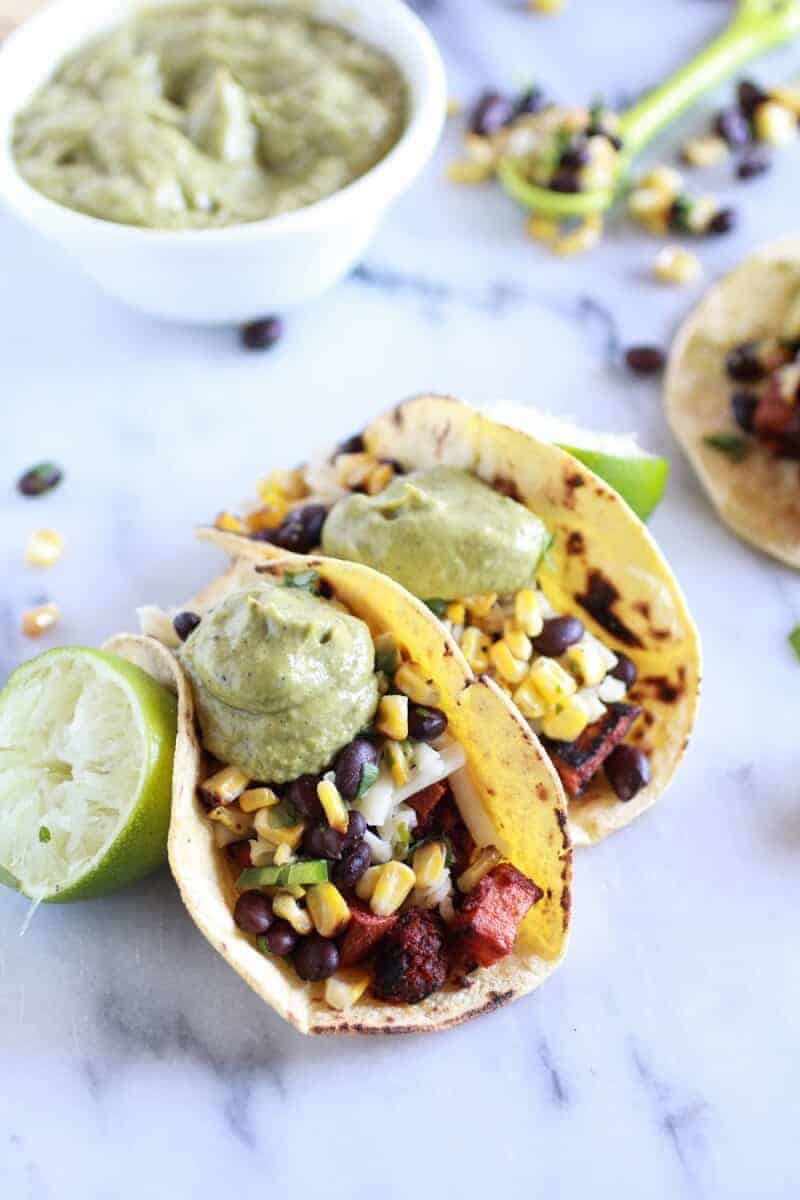Sweet potato + Chorizo Tacos with Black Bean Salsa and Roasted Poblano Avocado Crema | halfbakedharvest.com