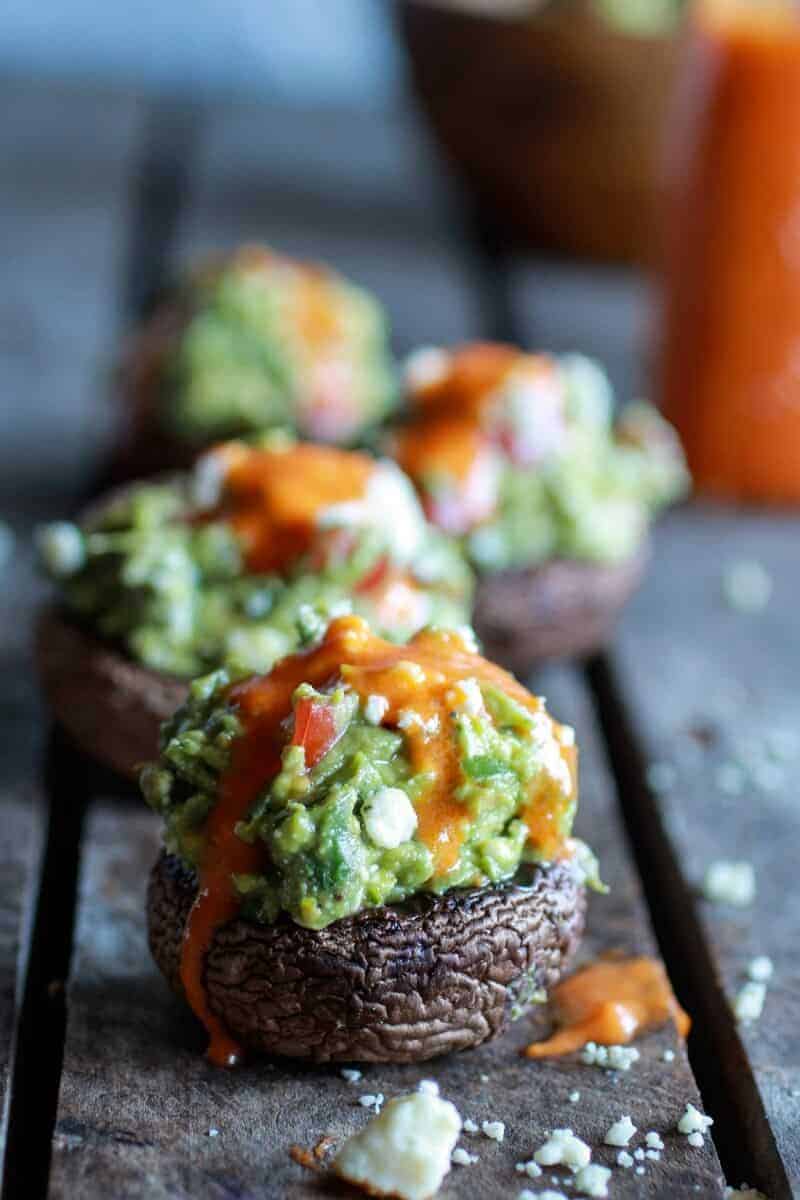 Blue Cheese Guacamole Stuffed Mushrooms with Buffalo Sauce | halfbakedharvest.com