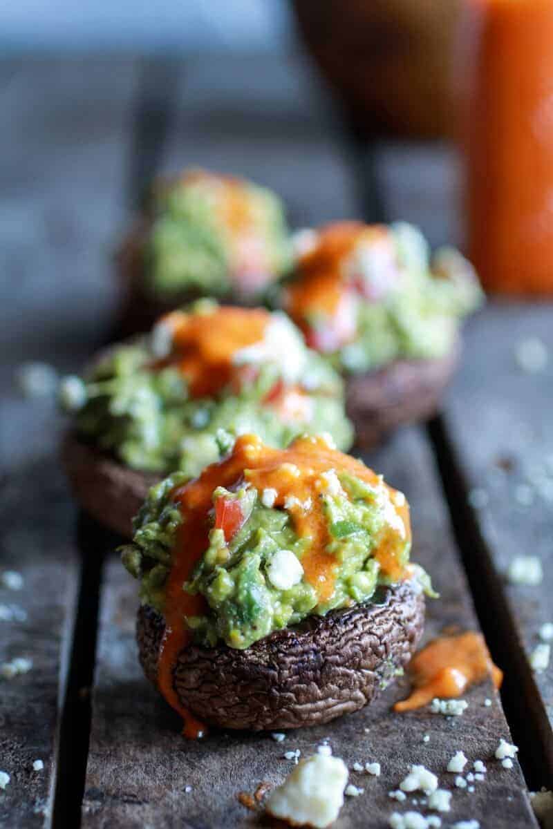 Blue Cheese Guacamole Stuffed Mushrooms with Buffalo Sauce | halfbakedharvest.com