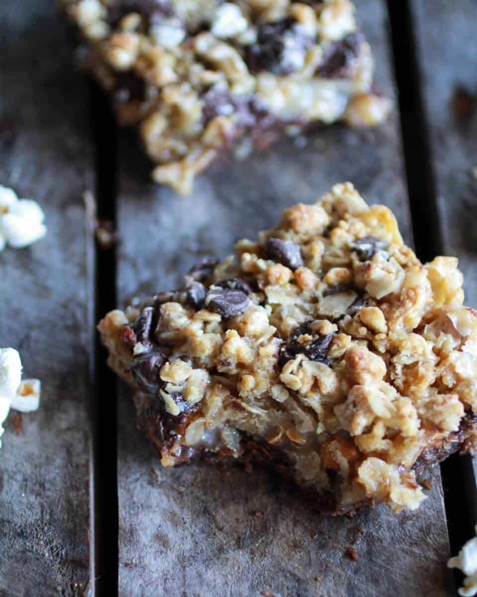 Fudge Brownie, Caramel, Popcorn + Oatmeal Cookie Crumble 7 Layer Bars | halfbakedharvest.com