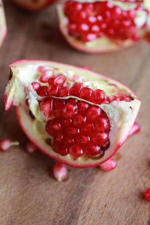 Crockpot Sweet and Sour Pomegranate Short Ribs with Creamy Polenta | halfbakedharvest.com