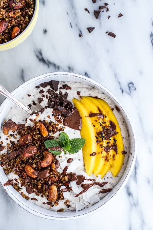 Coconut Banana Oats Smoothie Bowl with Crunchy Black Sesame Quinoa Cereal + Mango | halfbakedharvest.com