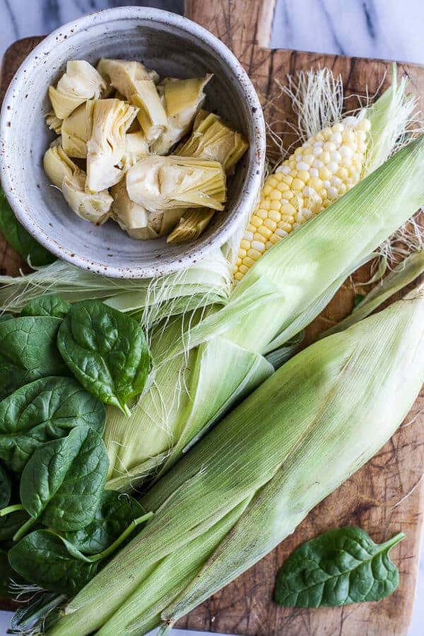 Spinach and Artichoke Corn Fritters with Brie and Sweet Honey Jalapeño Cream | halfbakedharvest.com