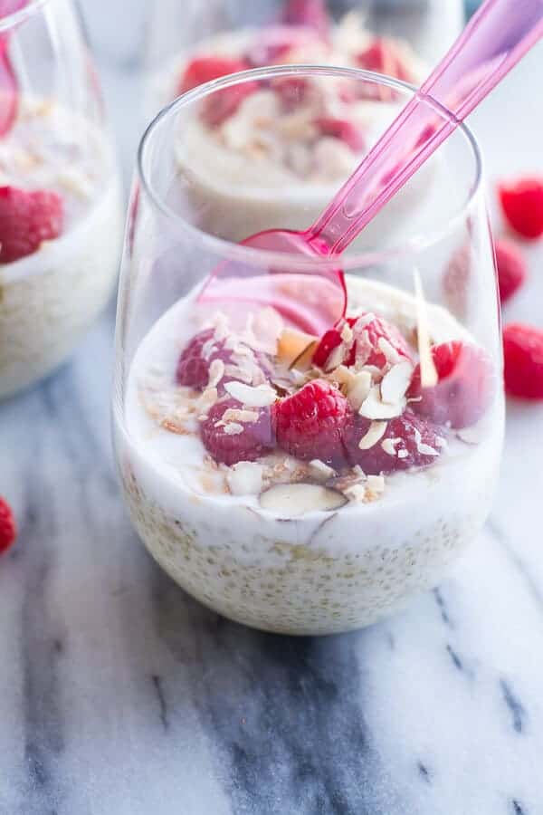 Vanilla Bean Coconut Quinoa Pudding with Honey Drizzled Raspberries | halfbakedharvest.com