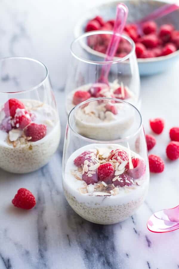 Vanilla Bean Coconut Quinoa Pudding with Honey Drizzled Raspberries | halfbakedharvest.com