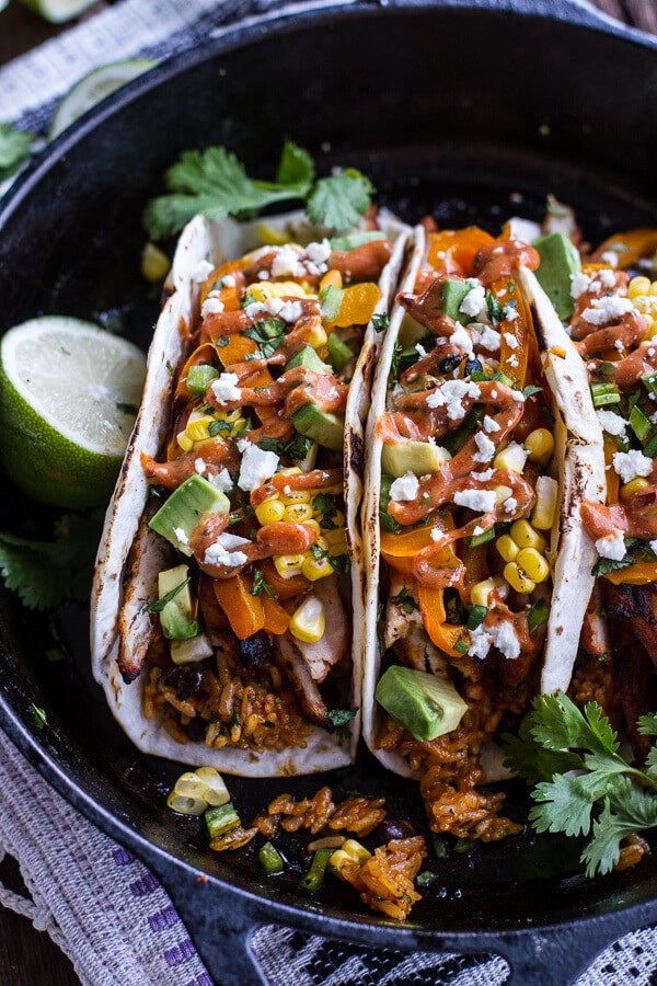 Easy Chicken Fajitas with Cheesy Enchilada Rice + Spicy Tex-Mex Special Sauce | halfbakedharvest.com