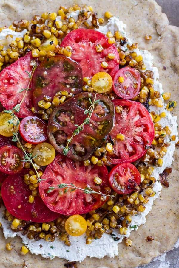 Caramelized Corn and Heirloom Tomato Galette w-Herbed Roasted Garlic Goat Cheese | halfbakedharvest.com @hbharvest