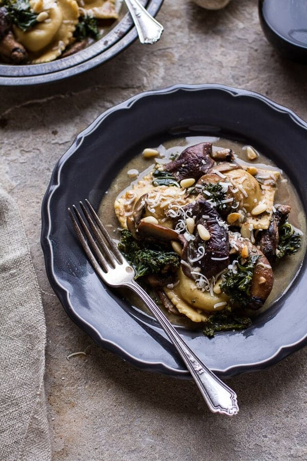 Taleggio Ravioli with Garlicy Butter Kale and Mushroom Sauce + Toasted Pine Nuts | halfbakedharvest.com @hbharvest