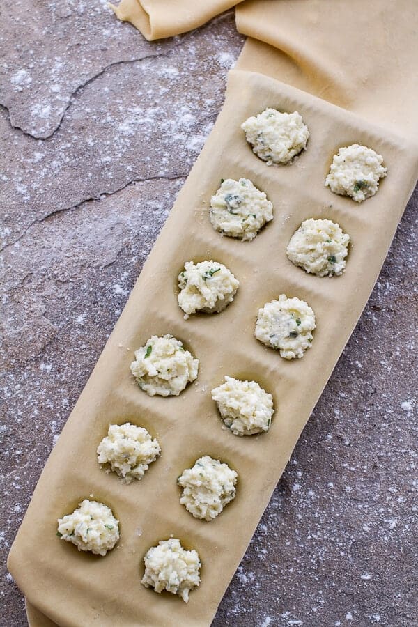 Taleggio Ravioli with Garlicy Butter Kale and Mushroom Sauce + Toasted Pine Nuts | halfbakedharvest.com @hbharvest