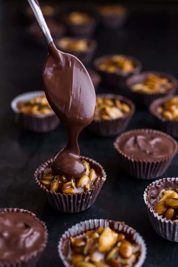 Mini Chocolate Pumpkin Seed Candy Peanut Butter Cups | halfbakedharvest.com @hbharvest