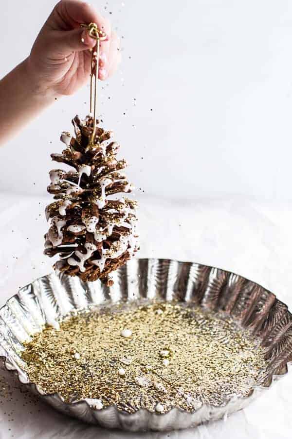Homemade Holidays: Snowy, Sparkly Pine Cone Ornaments | halfbakedharvest.com @hbharvest