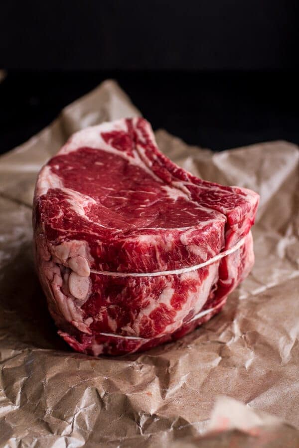 Coffee Rubbed Prime Rib Roast with Roasted Garlic Gorgonzola Butter | halfbakedharvest.com @hbharvest