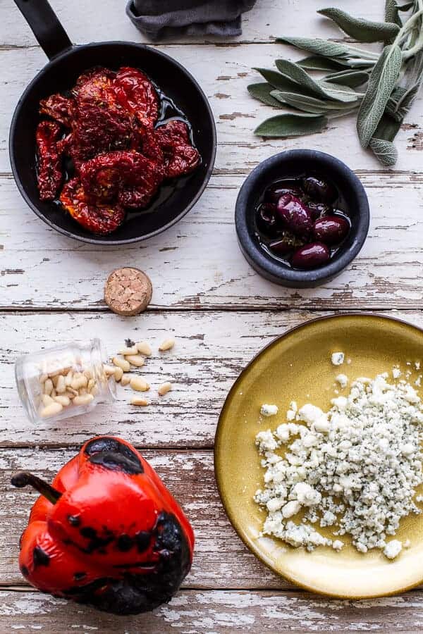 Sun-Dried Tomato and Olive Pesto Pizza with Salami + Roasted Red Peppers | halfbakedharvest.com @hbharvest