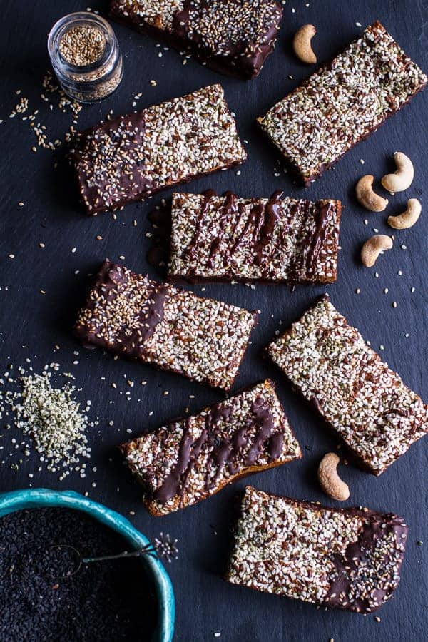 Dark Chocolate Dipped Crunchy Coconut Cashew Sesame Bars | halfbakedharvest.com @hbharvest