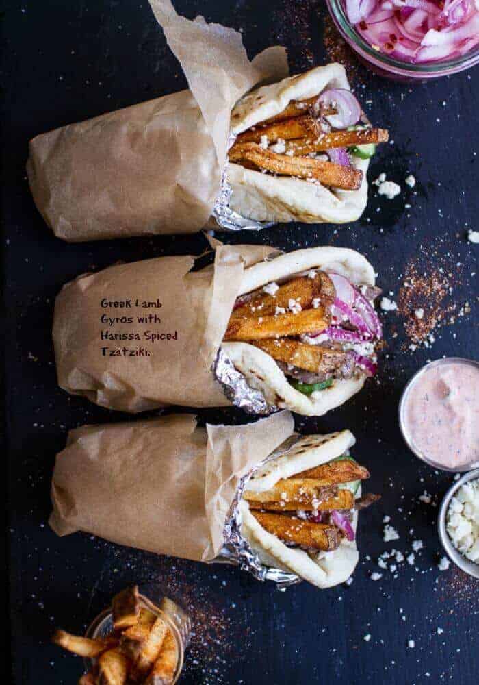 Greek Style Roasted Lamb Gyros with Harissa Spiced Tzatziki | halfbakedharvest.com @hbharvest