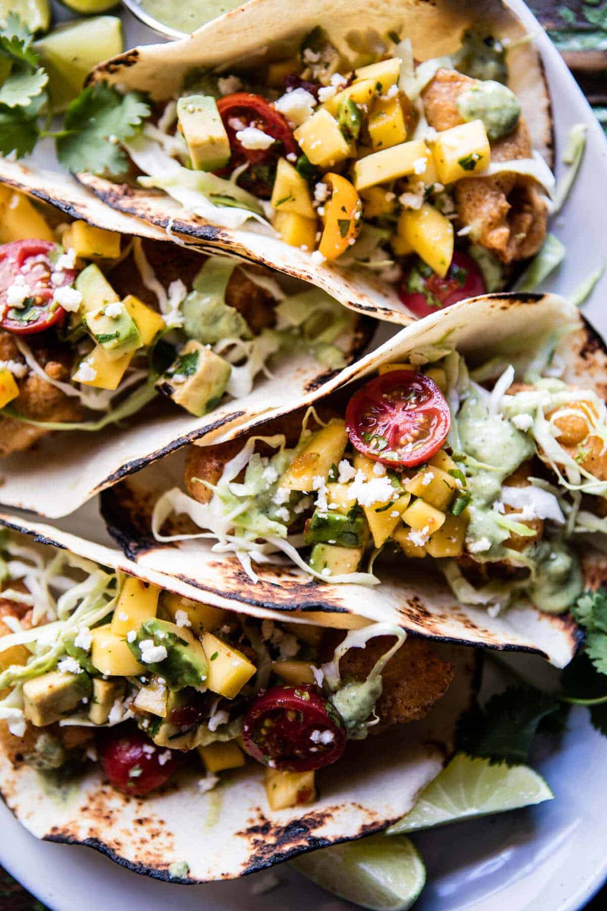 Baja Fish Tacos with Chipotle Mango Salsa | halfbakedharvest.com @hbharvest