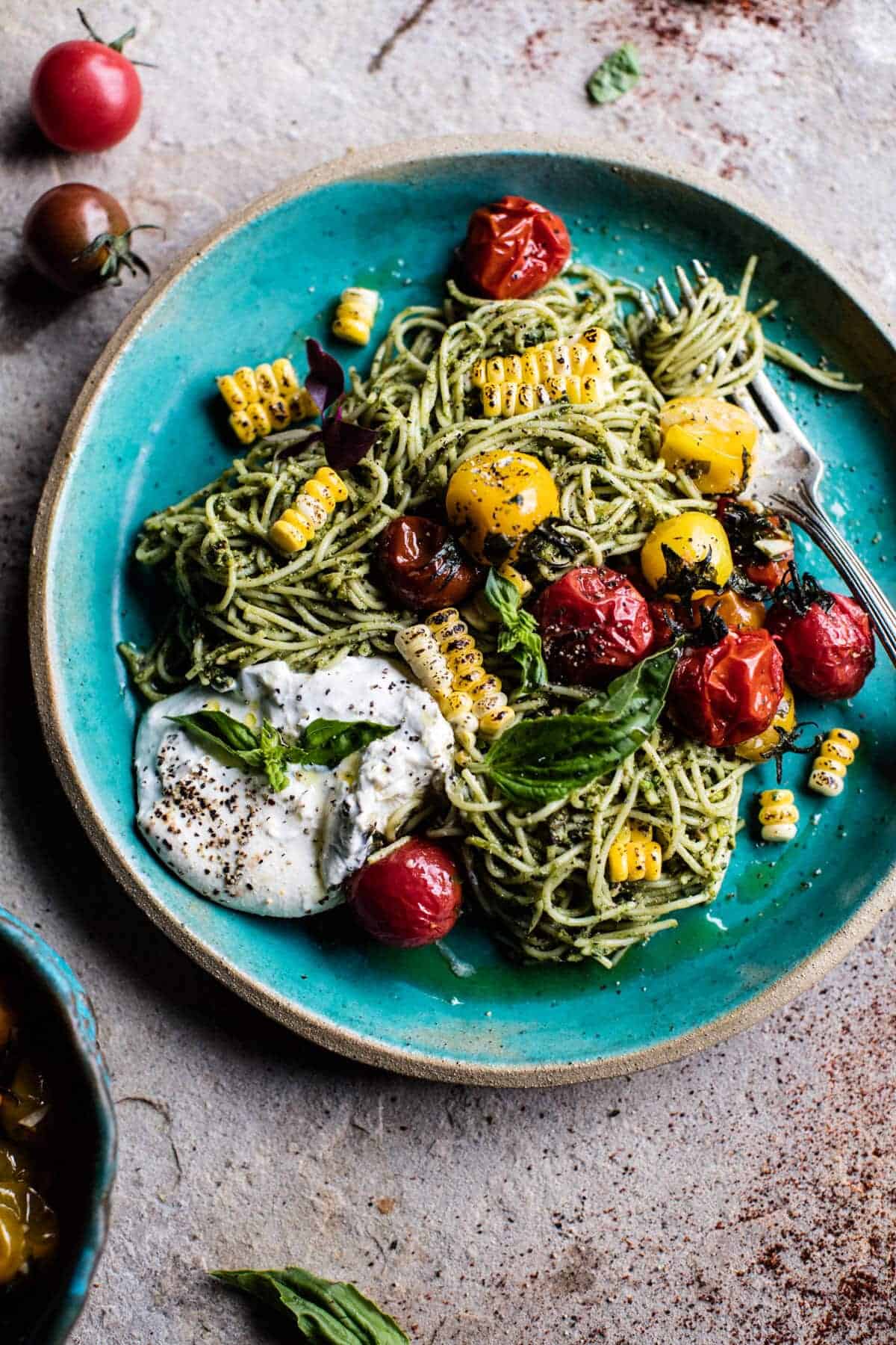 Charred Tomato and Corn Pesto Pasta | halfbakedharvest.com @hbharvest