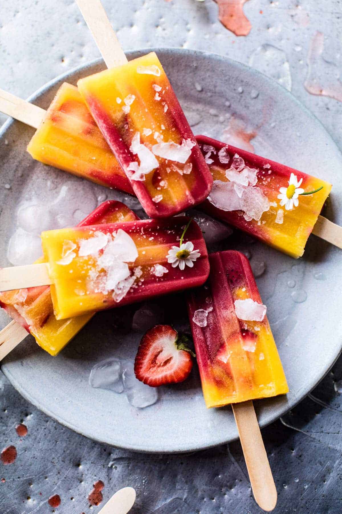 Three Ingredient Strawberry Mango Popsicles | halfbakedharvest.com @hbharvest
