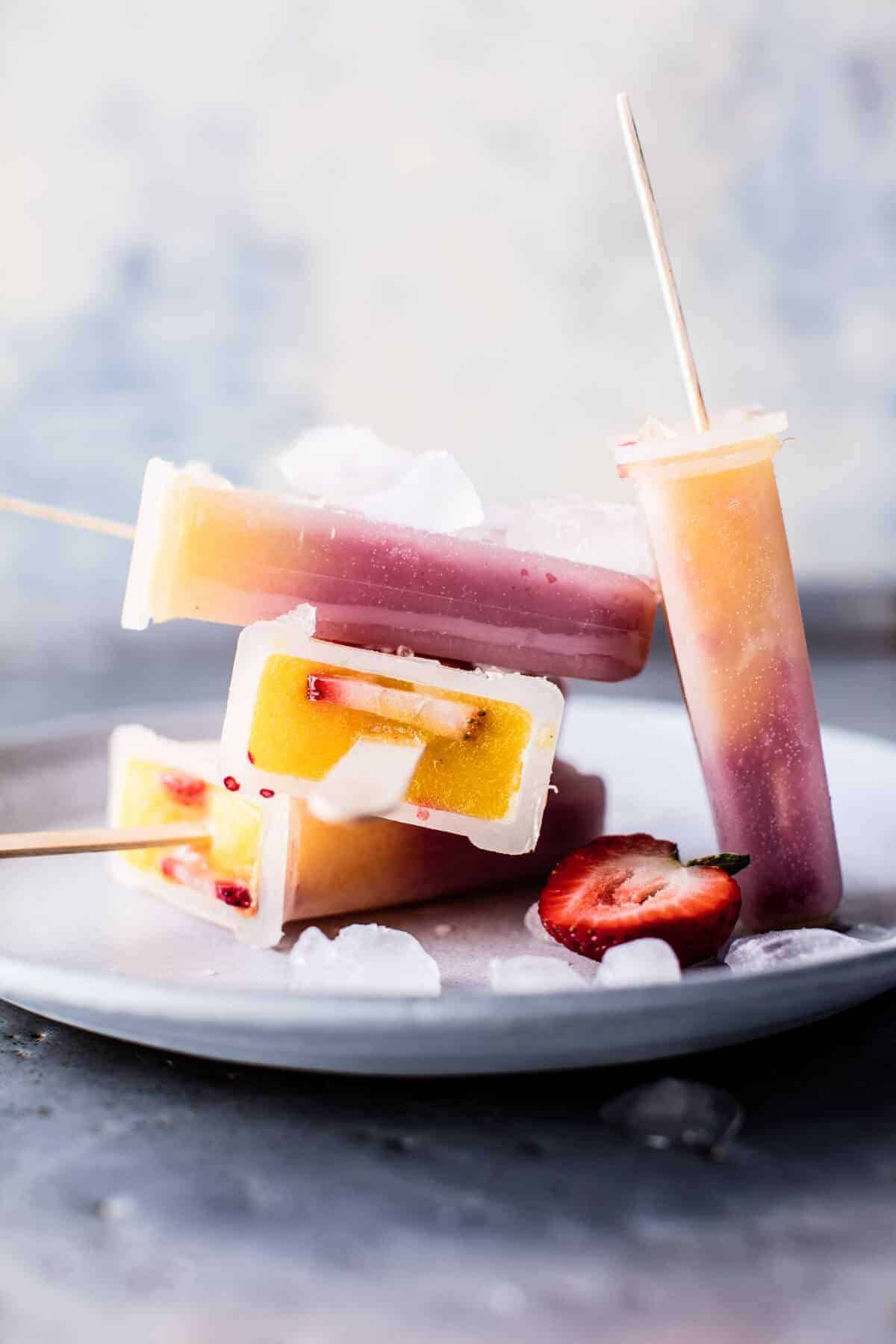 Three Ingredient Strawberry Mango Popsicles | halfbakedharvest.com @hbharvest