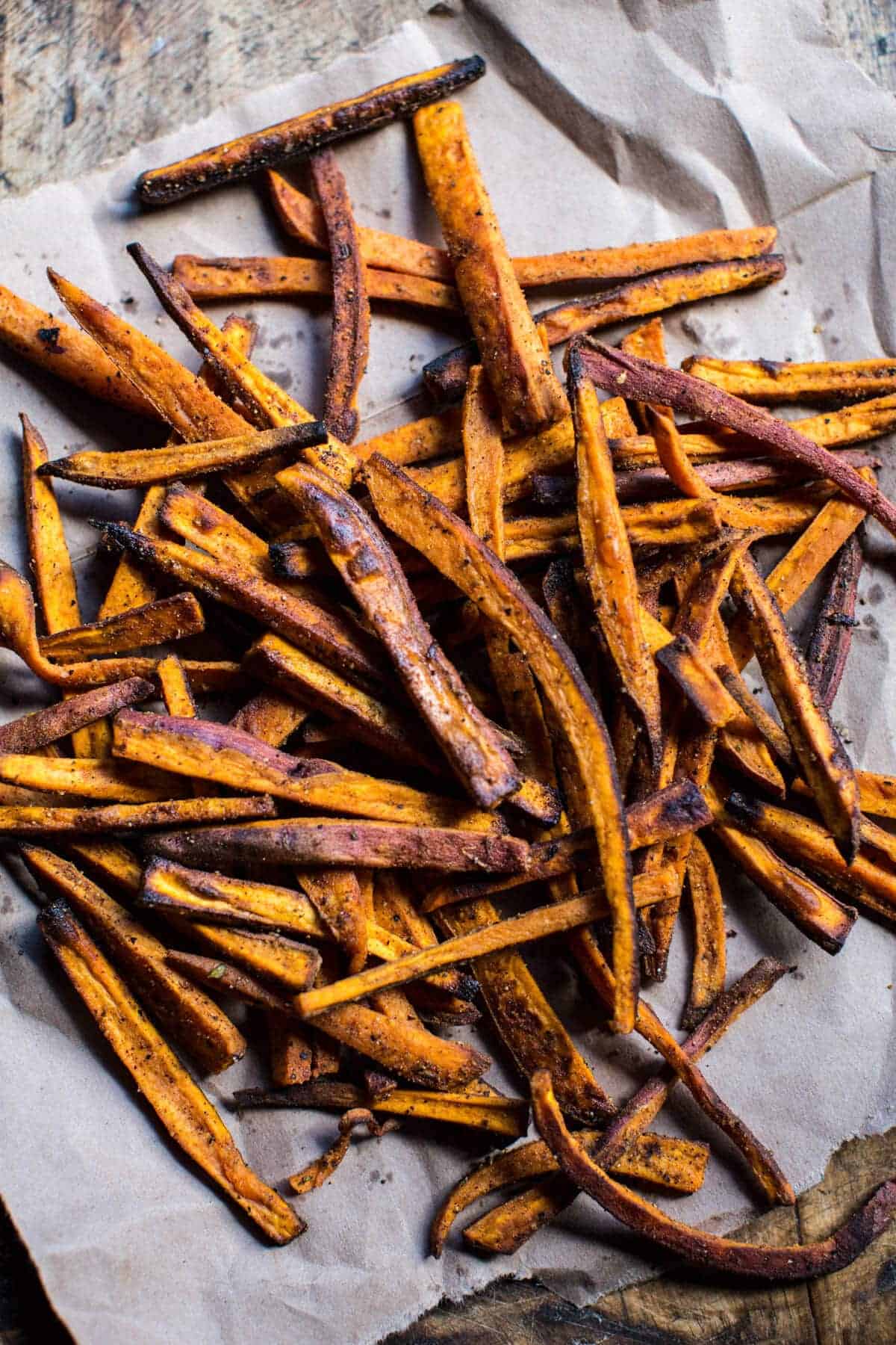 Skinny Cajun Sweet Potato Fries with Garlic Cheese Sauce | halfbakedharvest.com @hbharvest