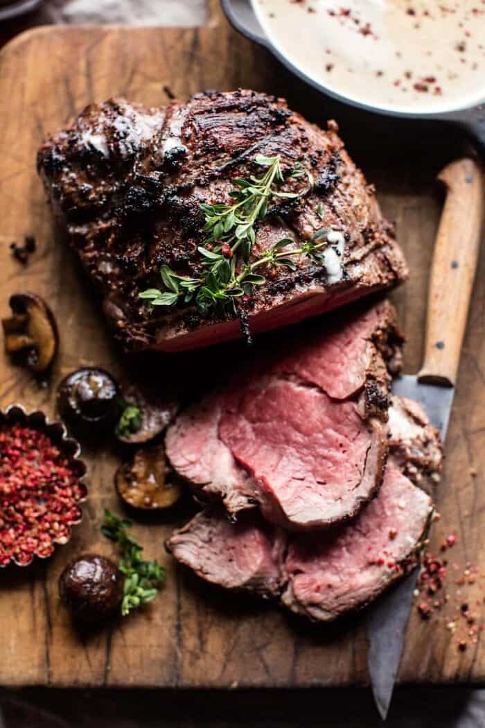 Roasted Beef Tenderloin with Mushrooms and White Wine Cream Sauce | halfbakedharvest.com