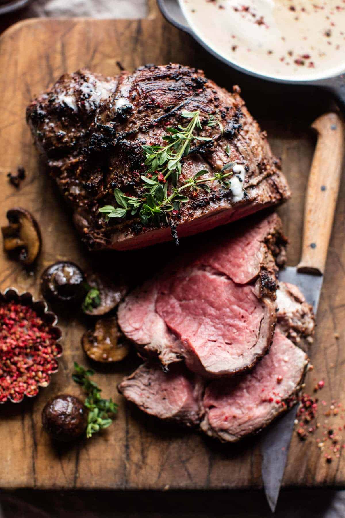 Roasted Beef Tenderloin with Mushrooms and White Wine Cream Sauce | halfbakedharvest.com