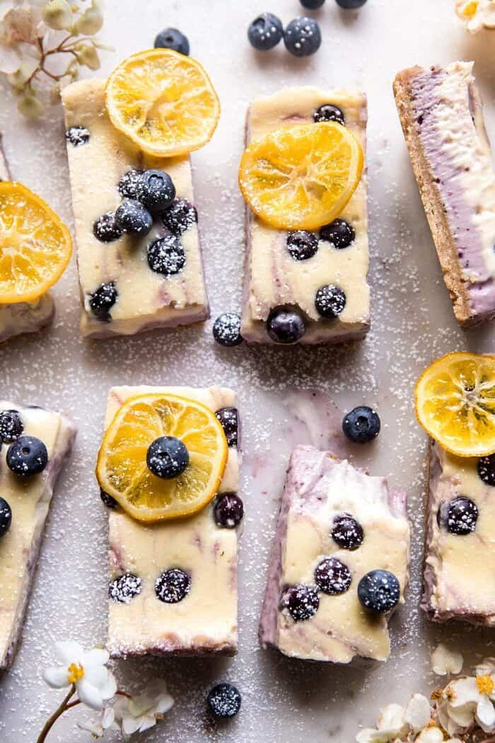 Blueberry Lemon Cheesecake Bars with Candied Lemon | halfbakedharvest.com #spring #easter #cheesecake #dessert