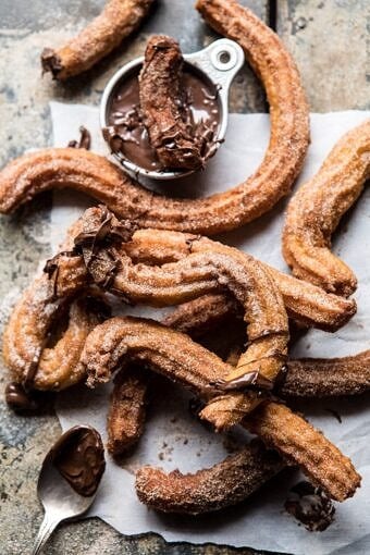 Easy Cinnamon Churros with Coffee Chocolate Sauce | halfbakedharvest.com #mexican #doughnut #dessert #chocolate