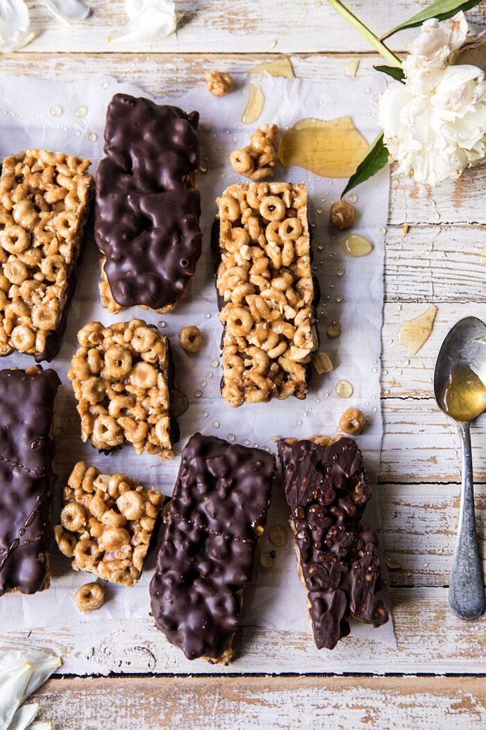Chocolate Dipped Peanut Butter and Honey Cheerio Bars | halfbakedharvest.com #chocolate #dessert #easyrecipe