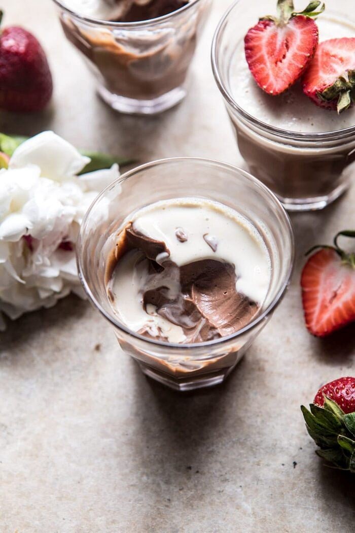 overhead photo of Creamy Mocha Custard with flowers and strawberries 