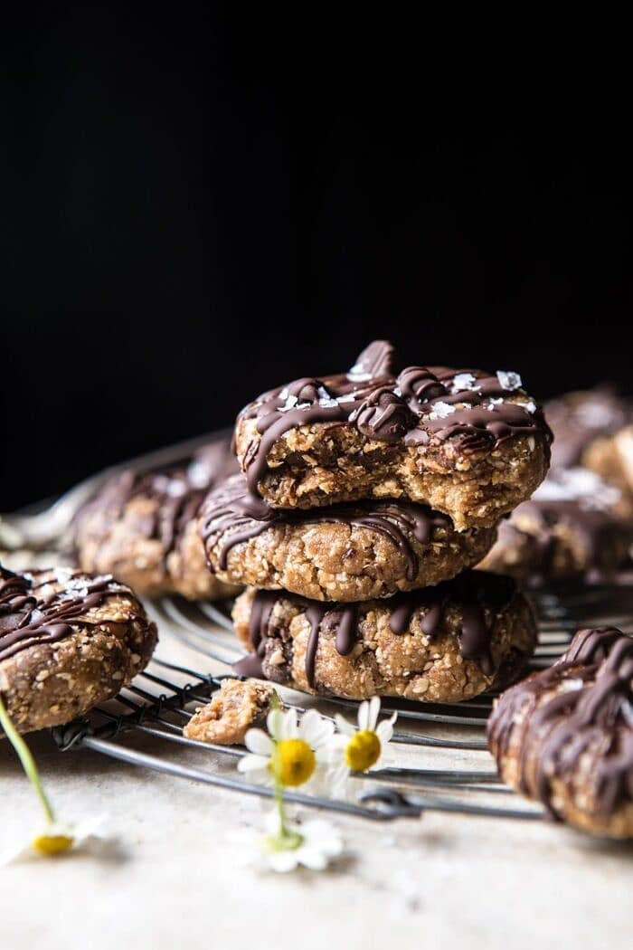 6 Ingredient No Bake Chocolate Chip Cookies stacked on top of each other with bite out of cookie