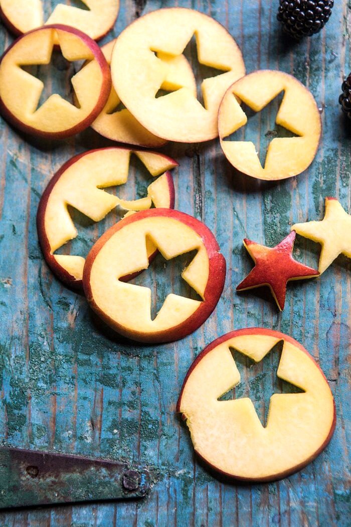 Smashed Berry Rose Spritz | halfbakedharvest.com #cocktails #4thofjulyrecipe #summerrecipes #easy