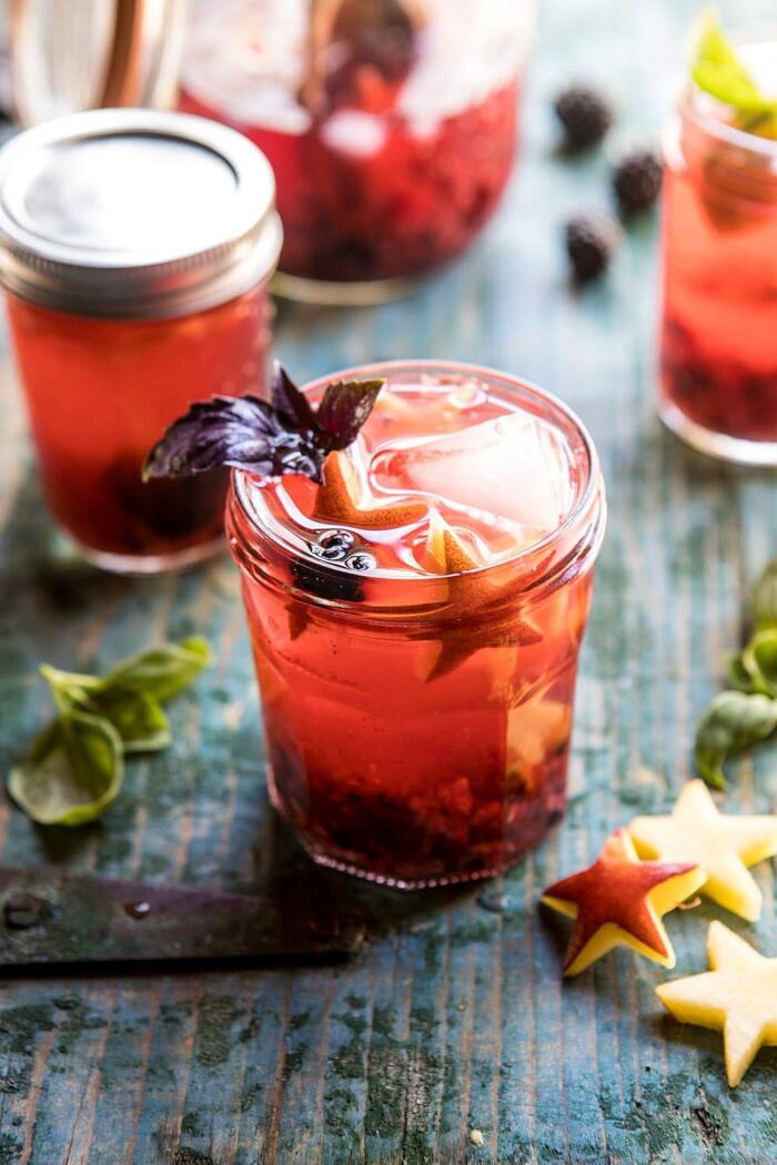 Smashed Berry Rose Spritz | halfbakedharvest.com #cocktails #4thofjulyrecipe #summerrecipes #easy