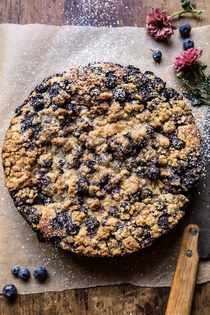 overhead photo of Bursting Blueberry Cardamom Buckle before being cut into 