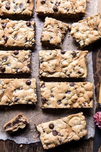 The Best Chocolate Chip Peanut Butter Swirled Cookie Bars | halfbakedharvest.com #cookies #cookiebars #peanutbutter #chocolate