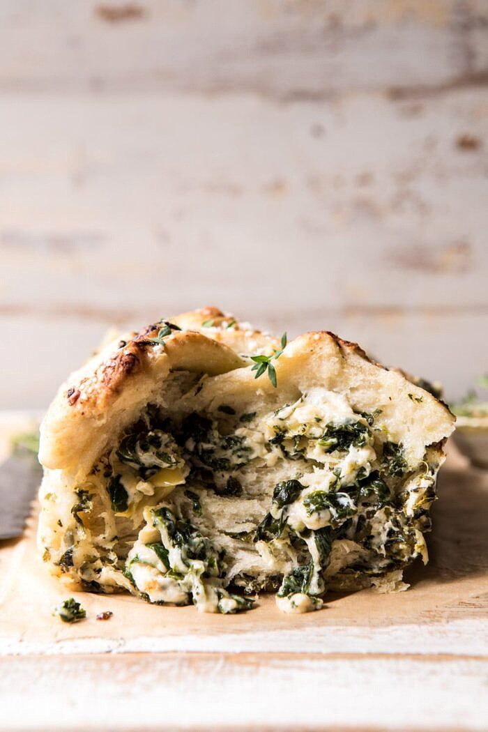 front on, close up photo of Herbed Spinach and Artichoke Pull Apart Pretzel Bread 