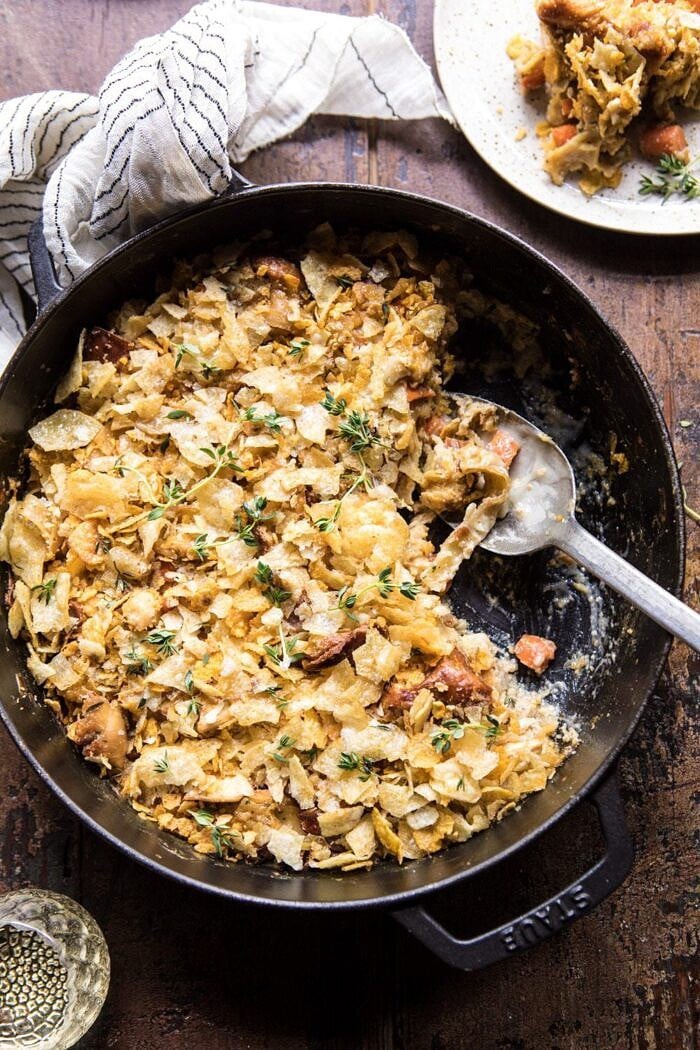 overhead photo of Homemade Chicken Noodle Casserole with spoon in baking dish
