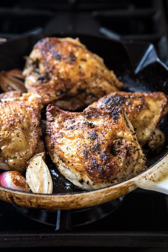 side angle photo of chicken in skillet