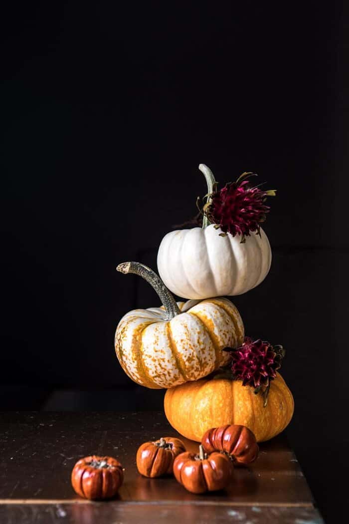 mini pumpkins stacked on top of each other