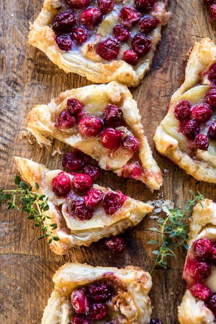 overhead photo Cranberry Brie Pastry Tart cut in half