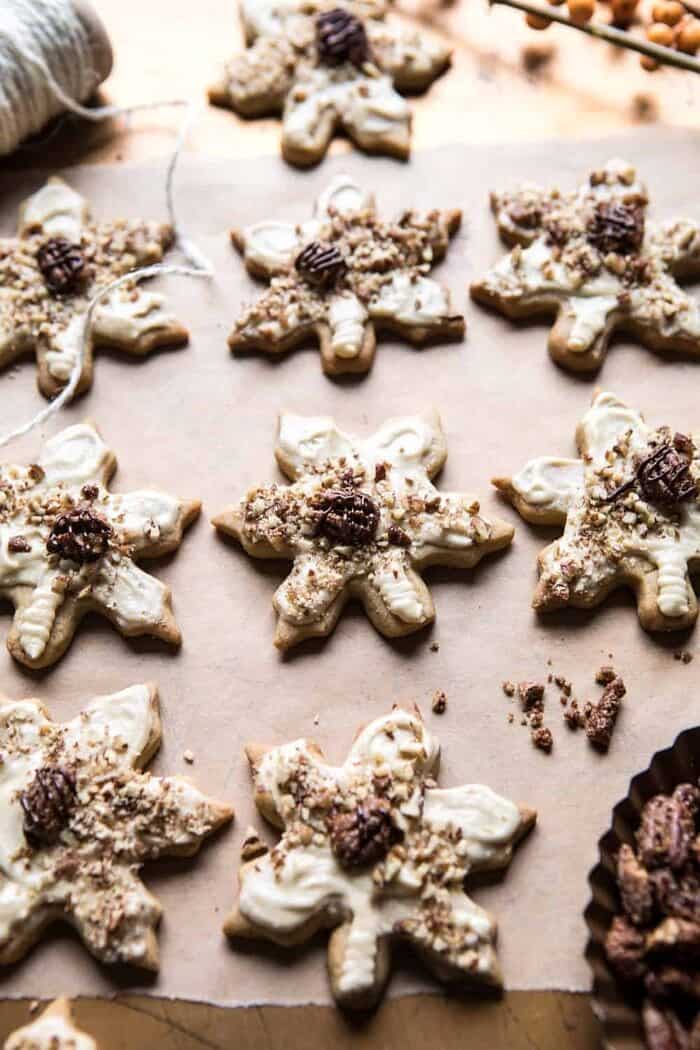 side angled photo of Pecan Pie Cookies with Butter Pecan Frosting with twine in corner