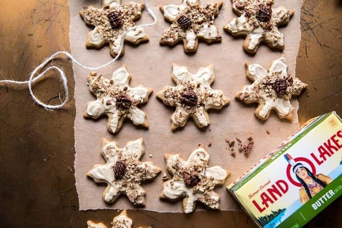 horizontal photo of Pecan Pie Cookies with Butter Pecan Frosting with land O'lakes butter in photo 